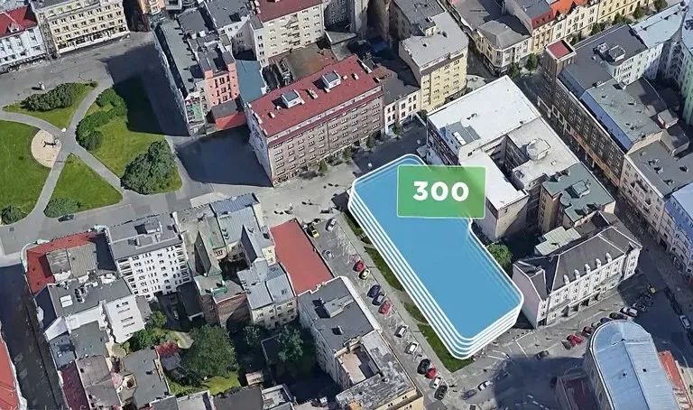 PODOBU PARKOVACÍHO DOMU ZA KATEDRÁLOU NAVRHNOU ARCHITEKTI